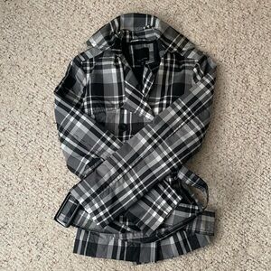 Barely worn cute and stylish black plaid raincoat!